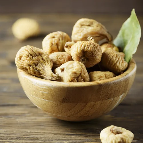 sweet-dried-italian-figs-on-the-wooden-table-2021-08-28-17-35-17-utc-scaled